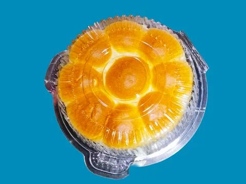 Bread in a transparent plastic container 库存照片