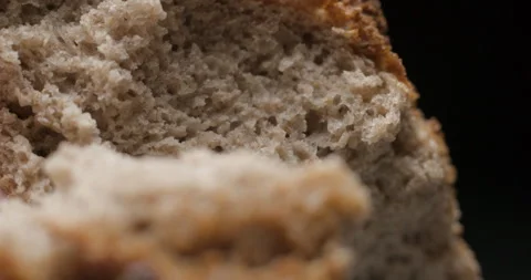 Bread wholegrain opening with hands slow motion Stock Footage 280519358