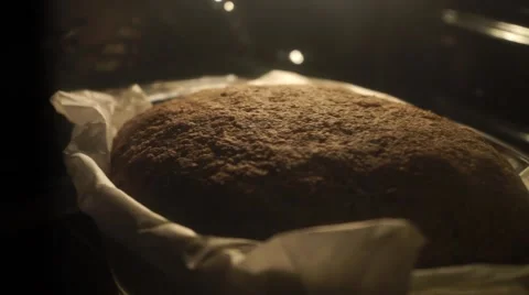 Bread Wholemeal baking in the oven at home Stock Footage 47874989