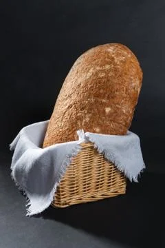 Bread in a wicker basket Foto stock
