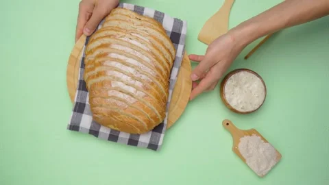 Bread without yeast. The concept of a healthy diet. Top view green background Video stock 199197874