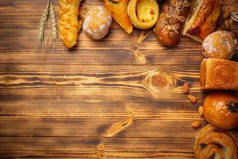 Bread On Wood Background Stock Photos