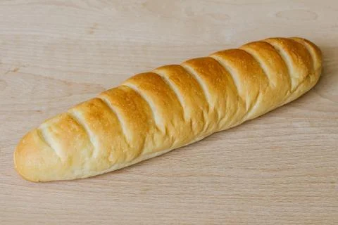 Bread on wooden background Stock Photos