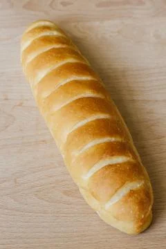 Bread on wooden background Stock Photos