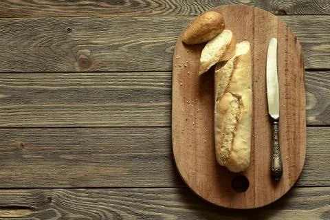 Bread on wooden background Stock Photos