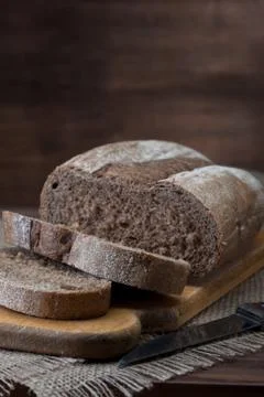 Bread on wooden background Stock Photos