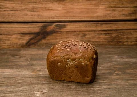 Bread on a wooden background Stock Photos