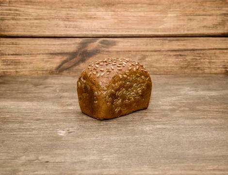 Bread on a wooden background Stock Photos
