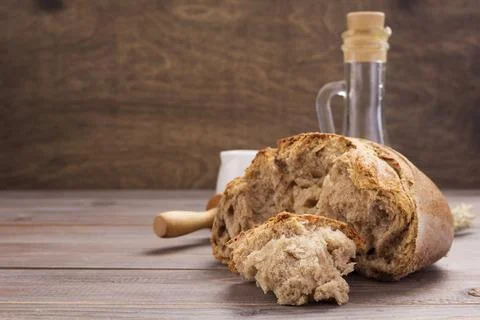 Bread on wooden table background Stock Photos