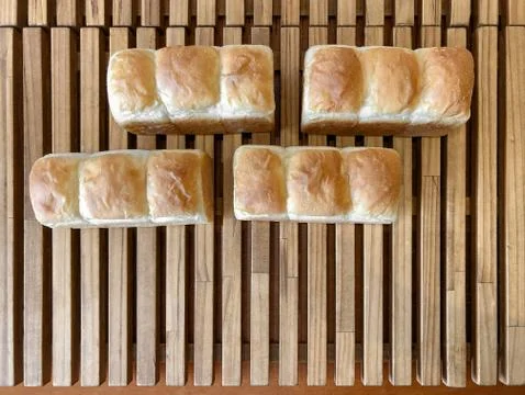 Bread on a wooden table. Stock Photos