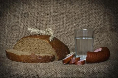 Bread on wooden table Stock Photos