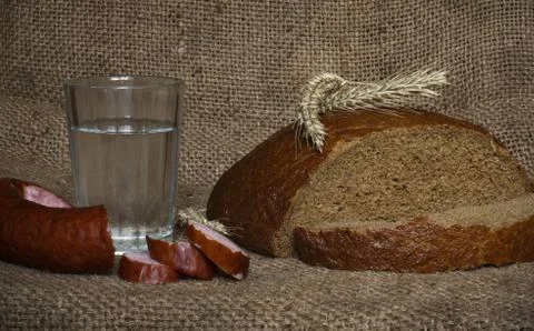 Bread on wooden table Stock Photos