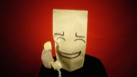 Breadbag red rotary phone shy bashful Stock Footage