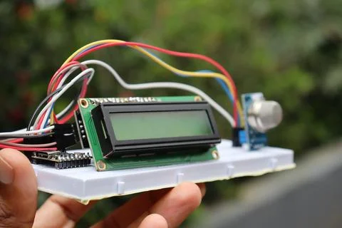 Breadboard circuit with focus on the LCD module and gas sensor module Stock Photos