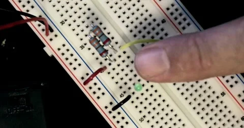 Breadboard engineer building circuits simple arduino homemade led Stock Footage 336585378