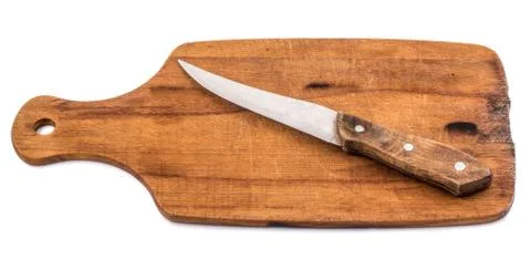 Breadboard with a knife isolated on a white background Stock Photos