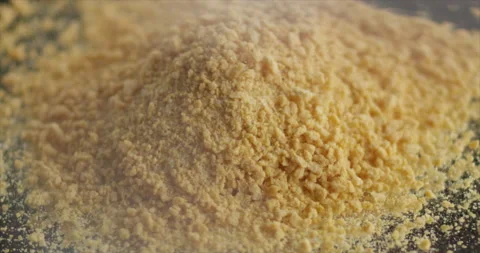 Breadcrumbs fall on a hill of breadcrumbs Stock Footage 199022627