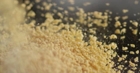 Breadcrumbs falling on a breadcrumbs Stock Footage 197427026