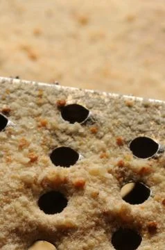 Breadcrumbs on a grater Stock Photos