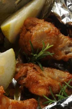 Breaded baked chicken in the baking dish Stock Photos