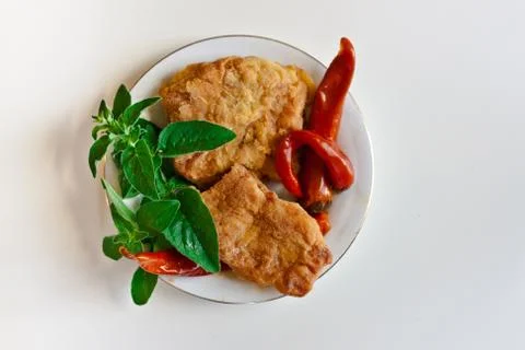 Breaded chicken with chili pepper Stock Photos