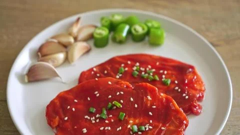 Breaded chicken cutlets with tomato sauce and side salad Stock Photos