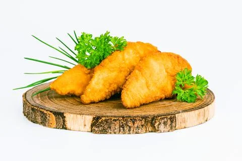 Breaded Chicken Inner Fillet on a White Background,Chicken Breaded Raw Meat Stock Photos