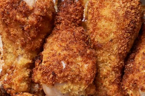 Breaded Chicken Legs Closeup 写真素材