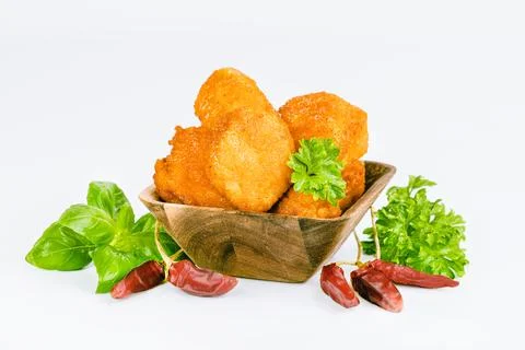Breaded chicken nuggets. Breaded Chicken Inner Fillet with green lettuce leaves Stock Photos
