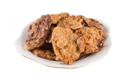 Breaded chicken schnitzel on a plate Stock Photos