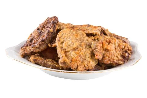 Breaded chicken schnitzel on a plate Stock Photos