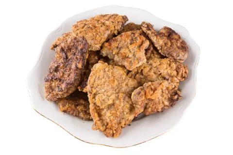 Breaded chicken schnitzel on a plate Stock Photos