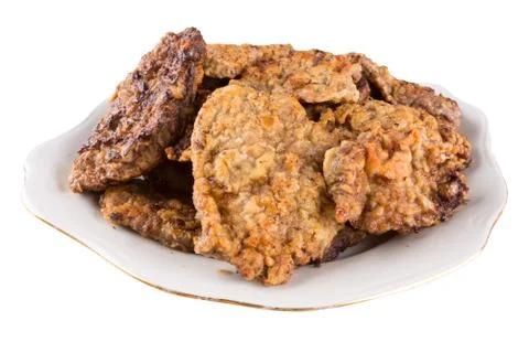 Breaded chicken schnitzel on a plate Stock Photos