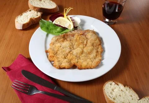 Breaded cutlet and vegetables Stock Photos