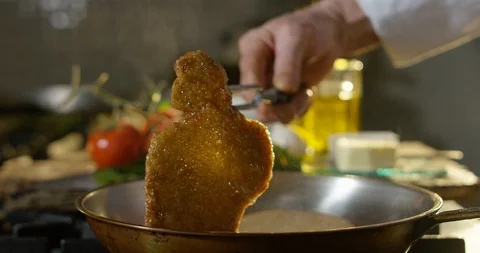 Breaded Cutlet Turned On A Frying Pan Stock Footage 85836013
