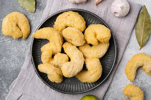 Breaded Deep Fried shrimps, on gray stone table background Stock Photos