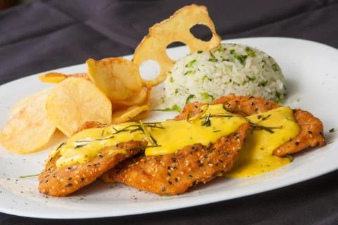 Breaded Fish with sauce Stock Photos