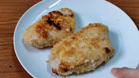 Breaded Fried Chicken Breast with Cheese Fillings Stock Footage 148402207