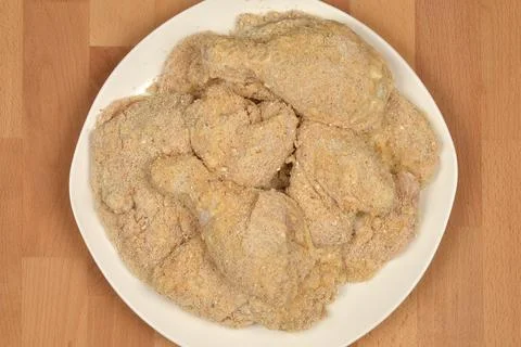 Breaded raw chicken Stock Photos