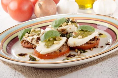 Breaded tomato slices with mozzarella Stock Photos