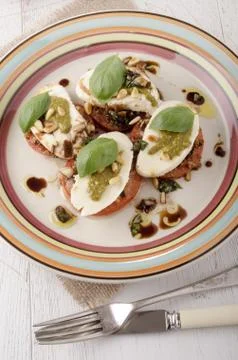 Breaded tomato slices with mozzarella Stock Photos