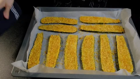 Breaded Zucchini on Baking Sheet in Cooking Kitchen Stock Footage 341453316