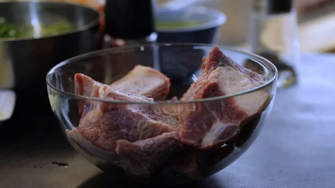 Breading beef ribs in flour Stock Footage 120462520