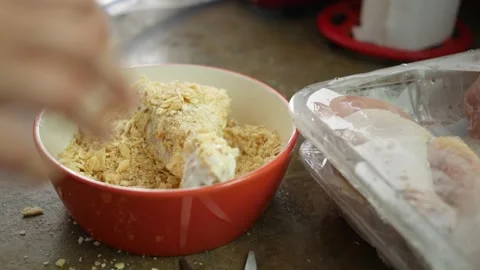 Breading Chicken Wing or Leg in Home Kitchen Stock Footage 315327071