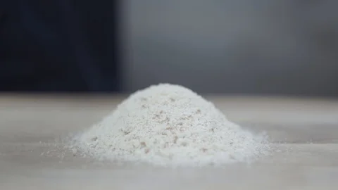 Breading patties with bread crumbs. Making burger patties Stock Footage 106631416