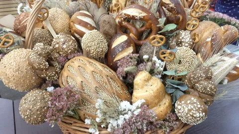 Breads and buns in a basket in 4K Stock Footage 142001732
