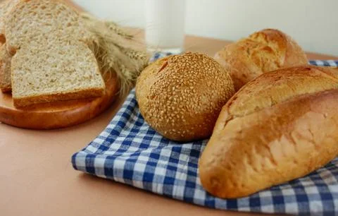 Breads and milk on table Stock Photos