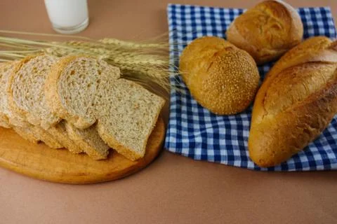 Breads and milk on table Stock Photos