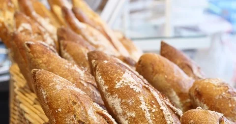 Breads baked goods assortment bakery shelves fresh organic whole grain bread bio Stock Footage 84058899