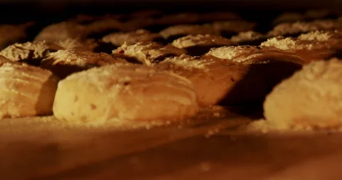 Breads baking in the oven at a bakery 4K close-up. Stock Footage 221565835